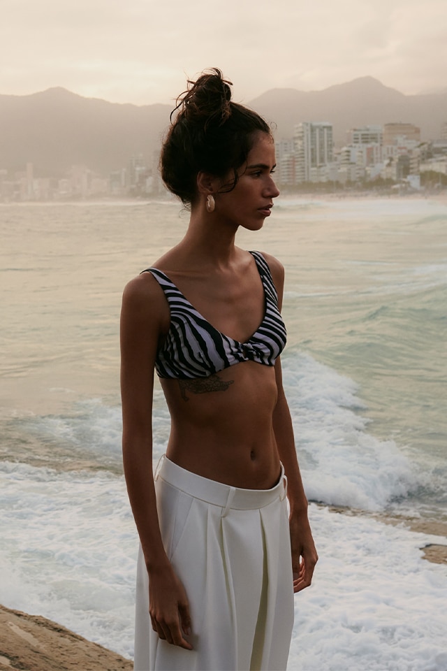 Check out our beachwear collection season collection - RESERVED banner