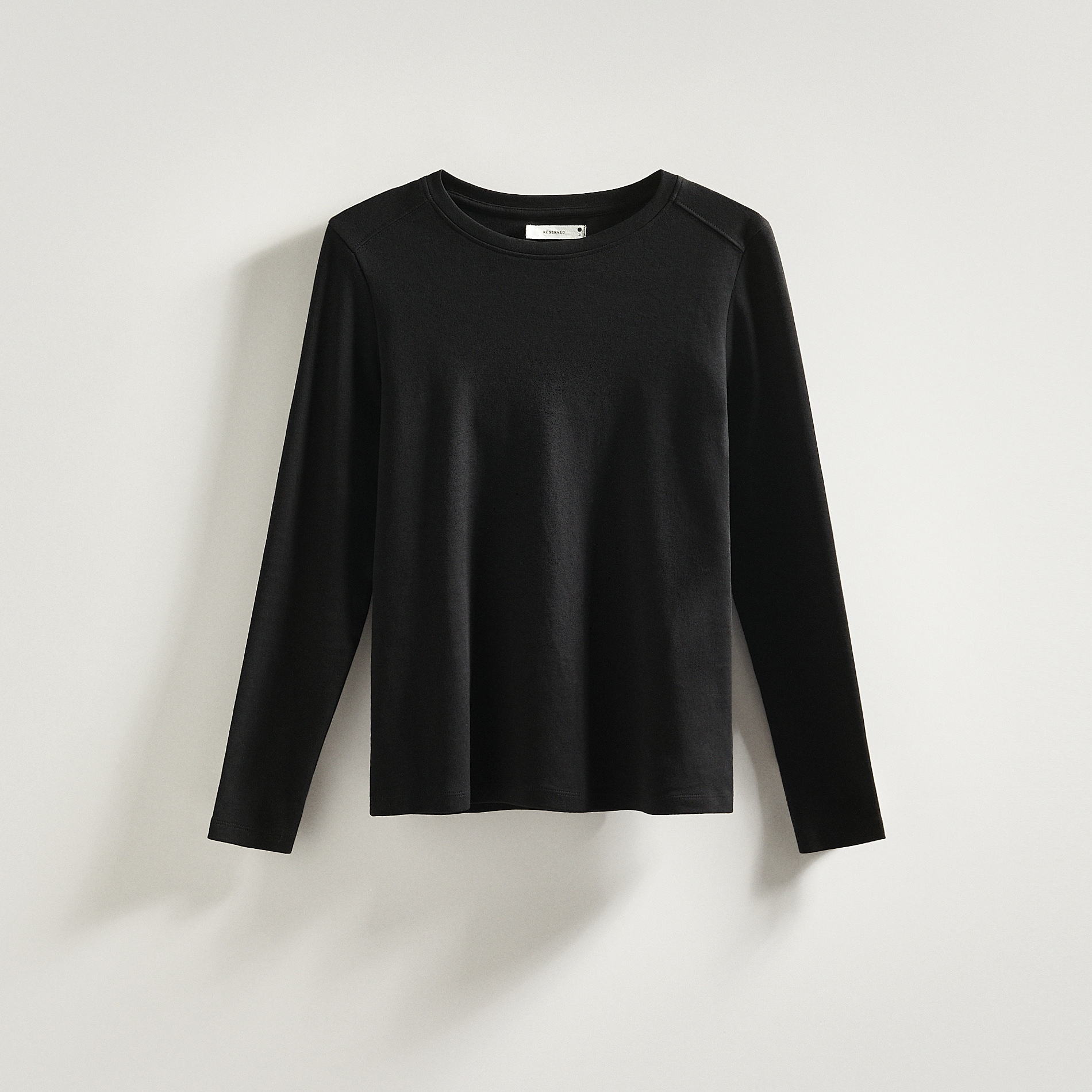 Levně Reserved - Bavlněné tričko s dlouhými rukávy - Černý