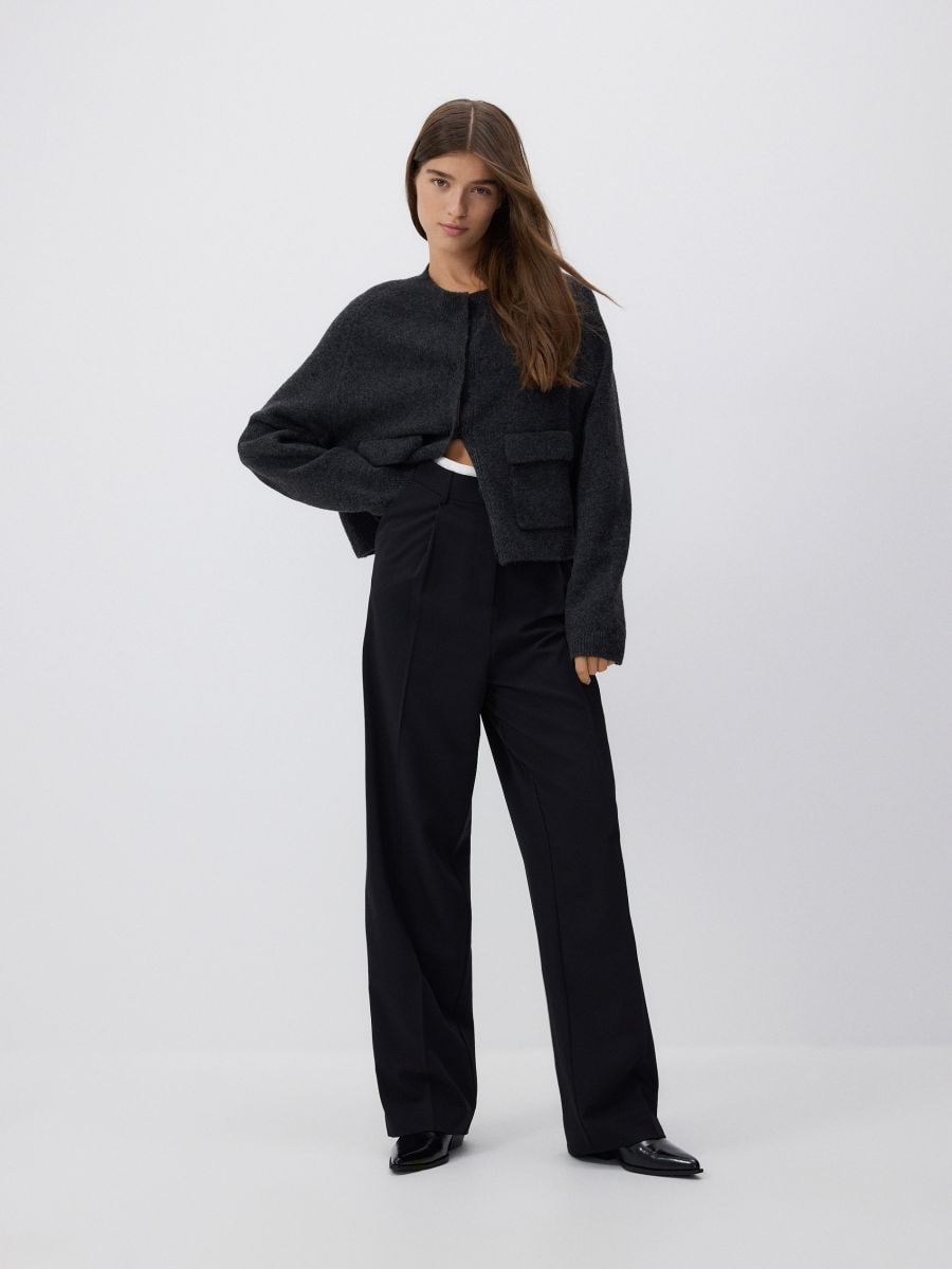 Pantalon holgado con plisados