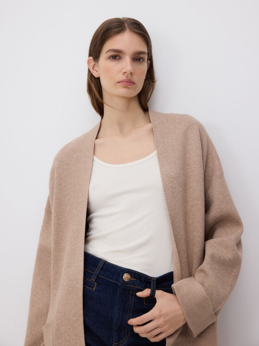 Cardigan with pockets - beige - RESERVED