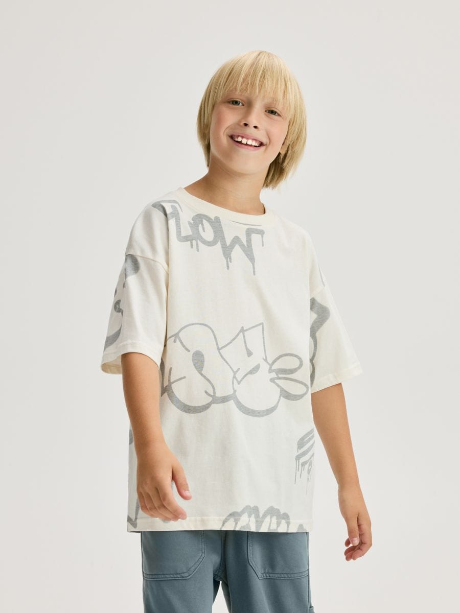 T-Shirt aus Baumwolle mit Aufdruck - creme - RESERVED