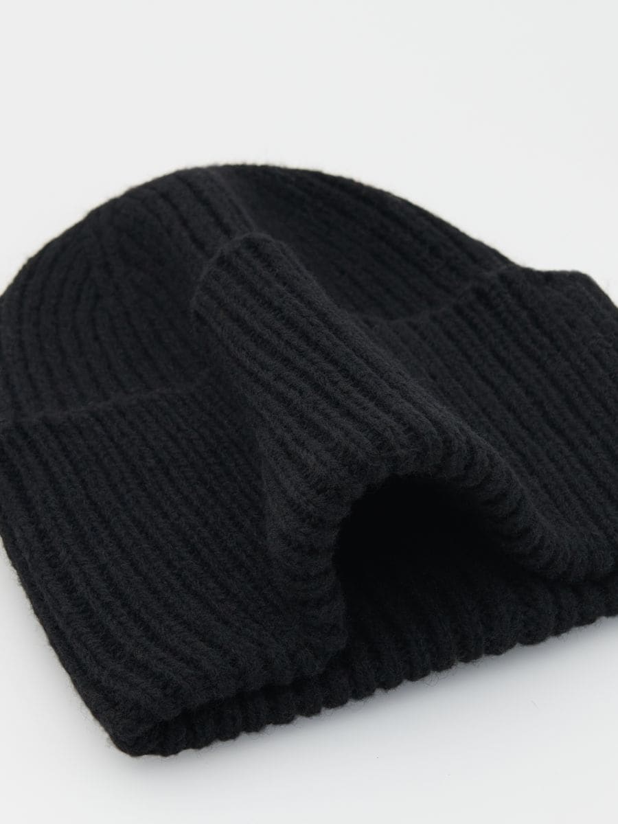 Beanie i uldblanding - sort - RESERVED - 2