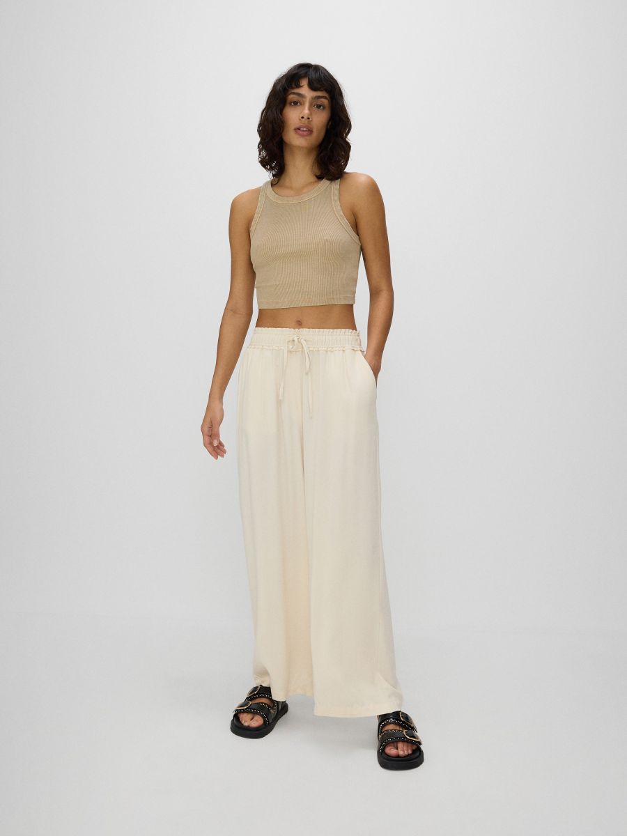 Viscose trousers - cream - RESERVED