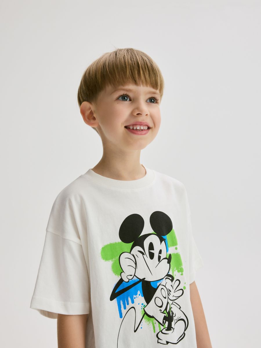 Bombažna majica Mickey Mouse - kremna - RESERVED