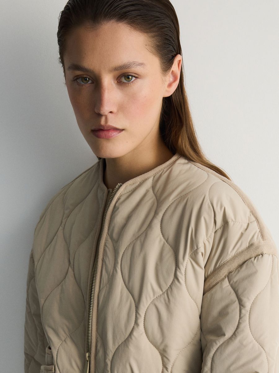 Tan quilted jacket store