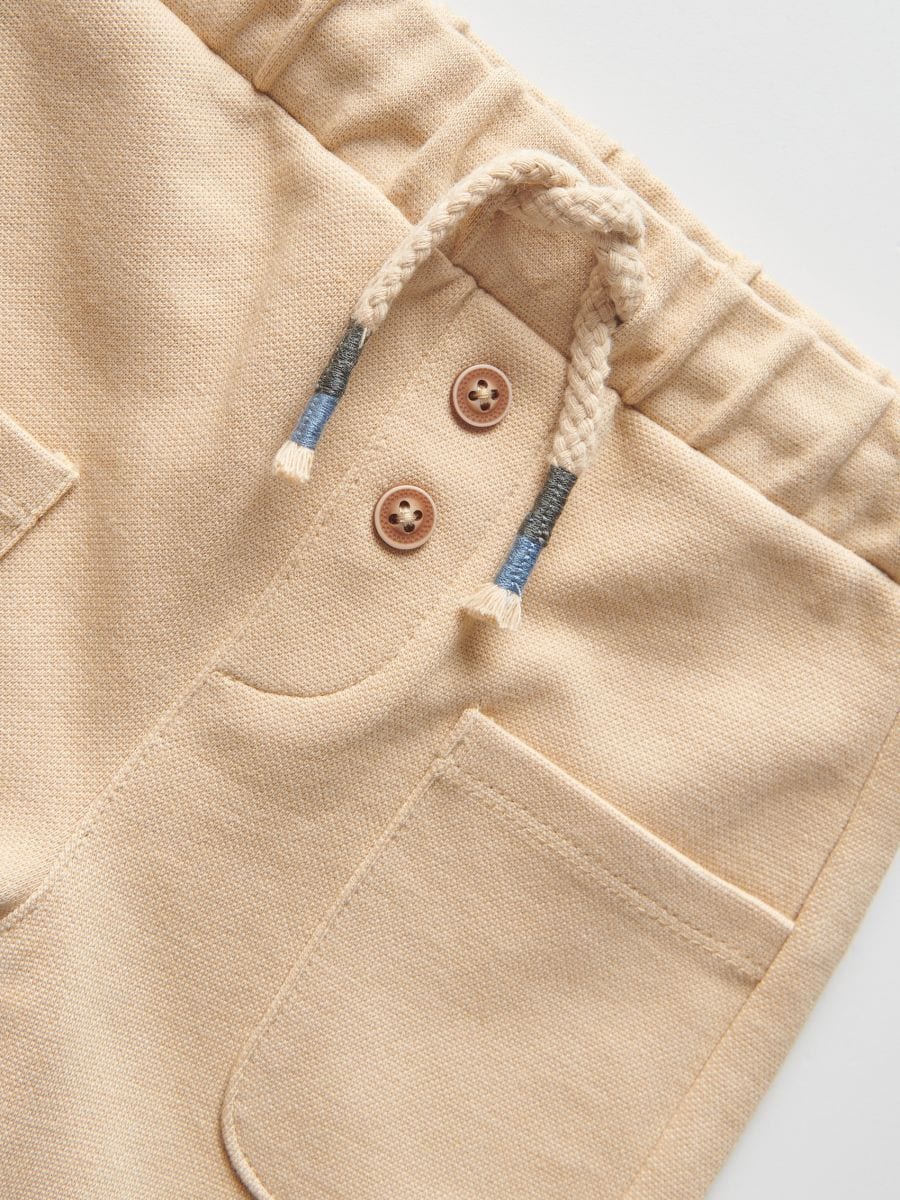 Jersey trousers with pockets - beige - RESERVED - 3
