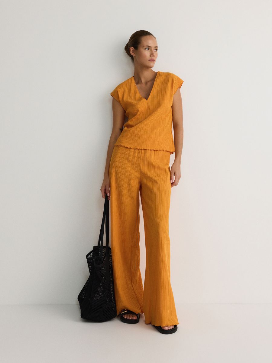 Loose rib knit trousers - orange - RESERVED