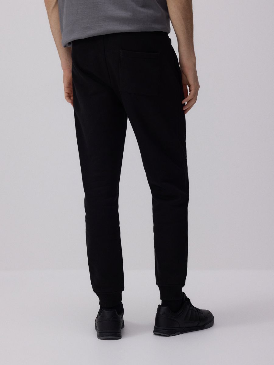 Regular fit tracksuit bottoms - black - RESERVED - 7