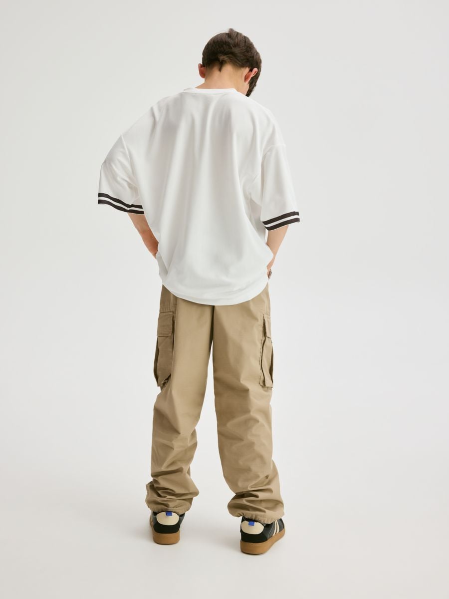 Cargo trousers with pockets - beige - RESERVED - 4
