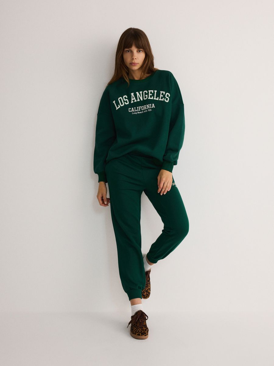 Printed sweatpants Color dark green RESERVED 2335I 79X