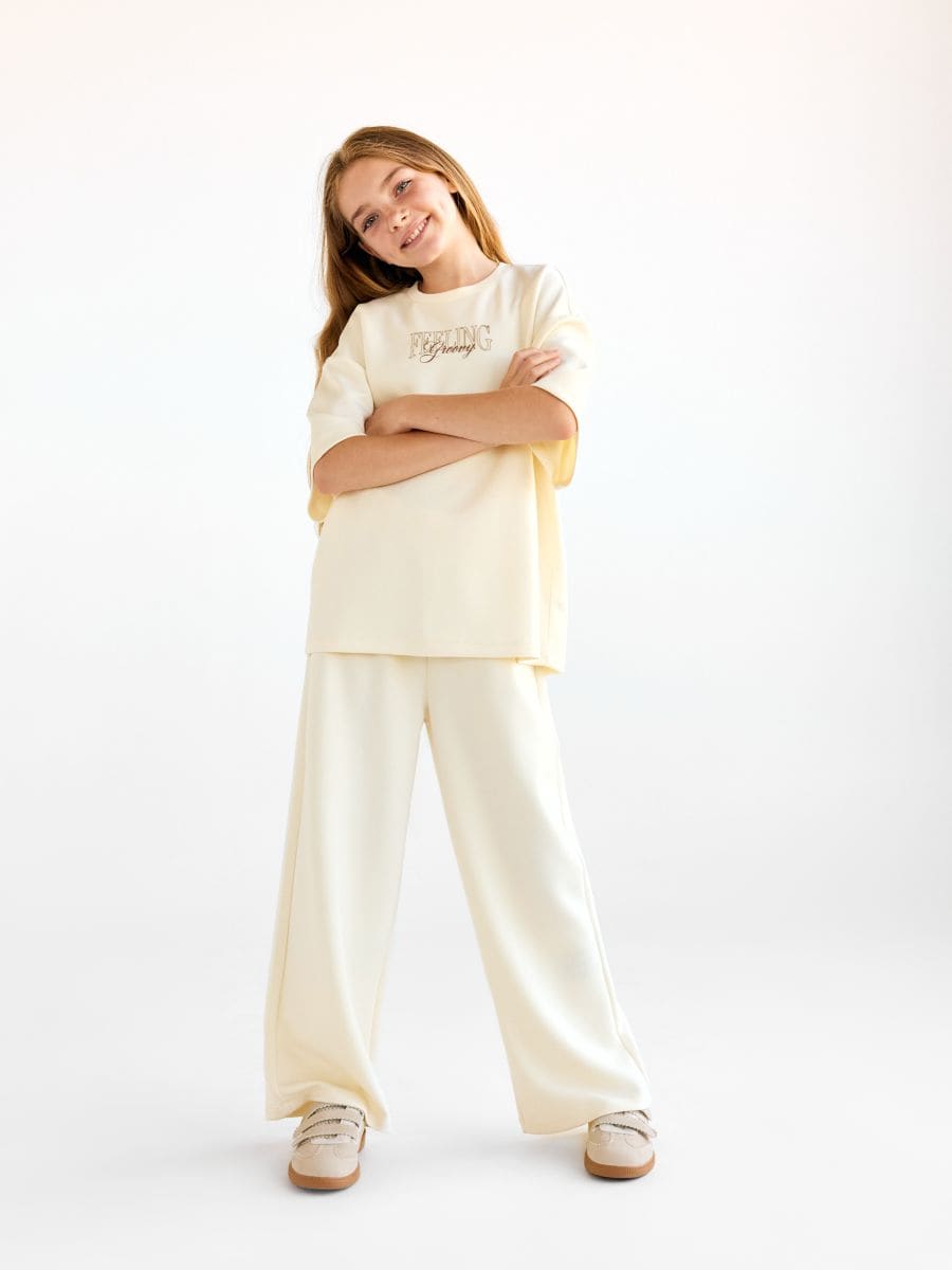 Wide leg trousers - nude - RESERVED