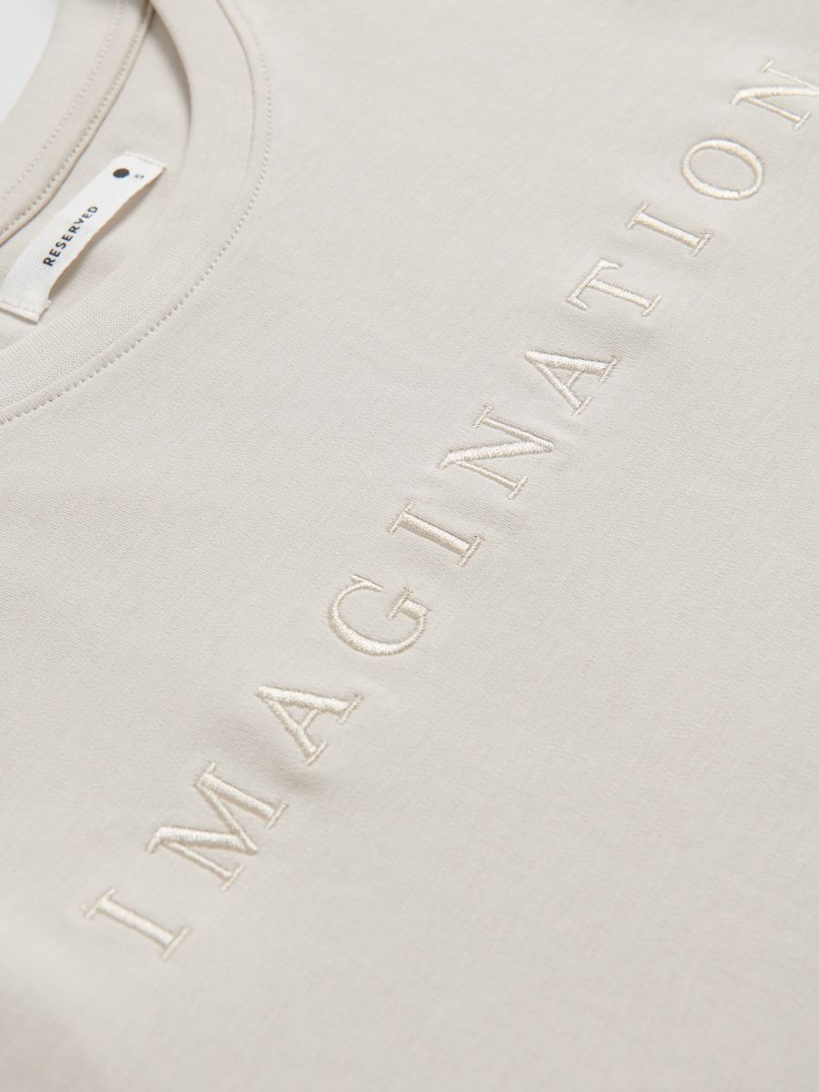 T-shirt with embroidered slogan - beige - RESERVED - 2