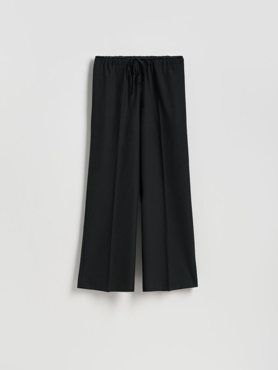 Loose rib knit trousers - black - RESERVED