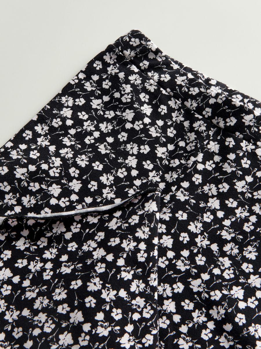 Patterned flare trousers - black - RESERVED - 4