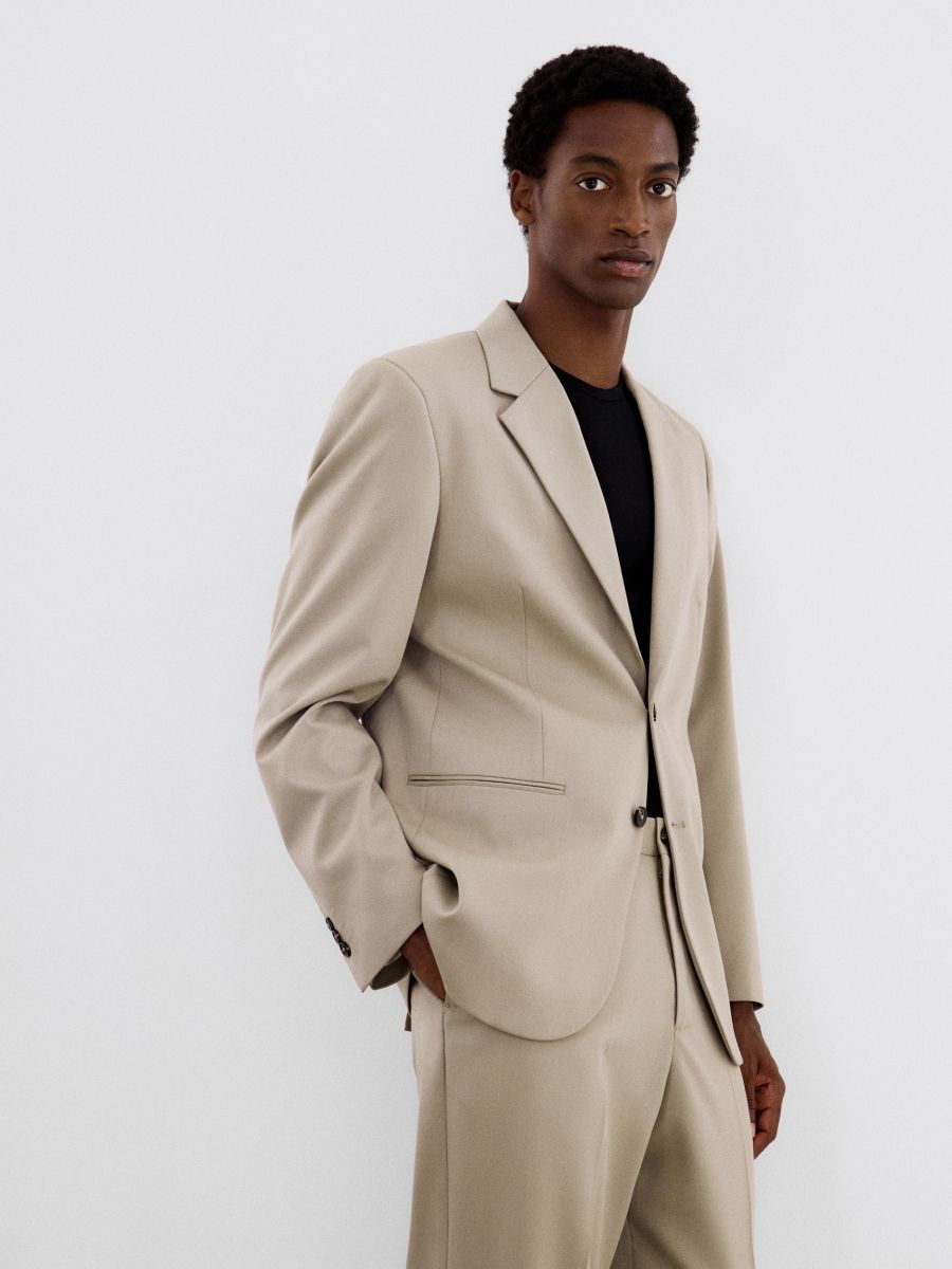 Straight trousers with pressed crease - beige - RESERVED - 2