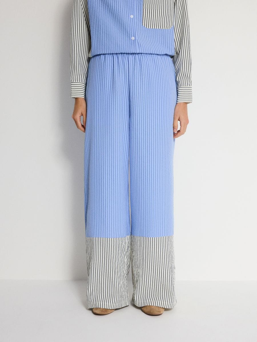 Trousers with contrast insert - multicolor - RESERVED - 2