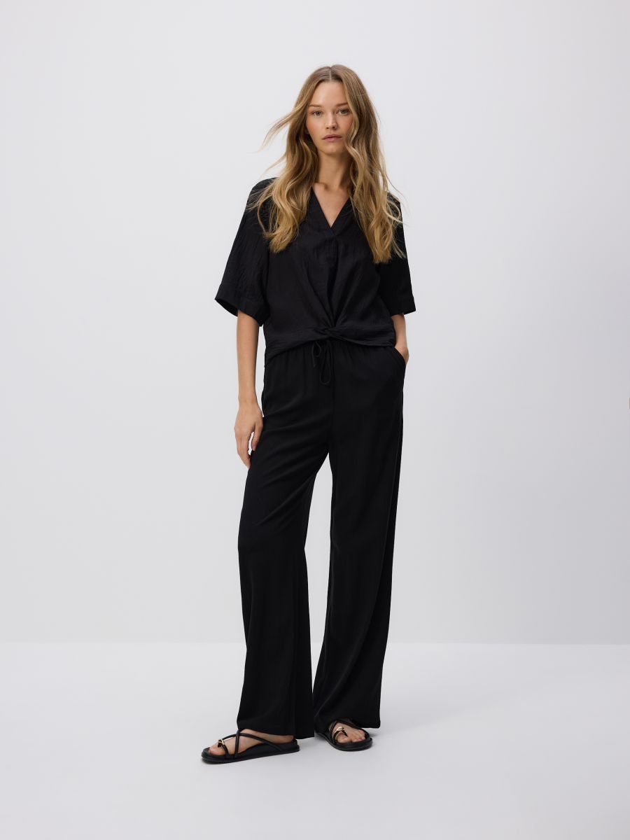 Loose trousers with linen blend - black - RESERVED