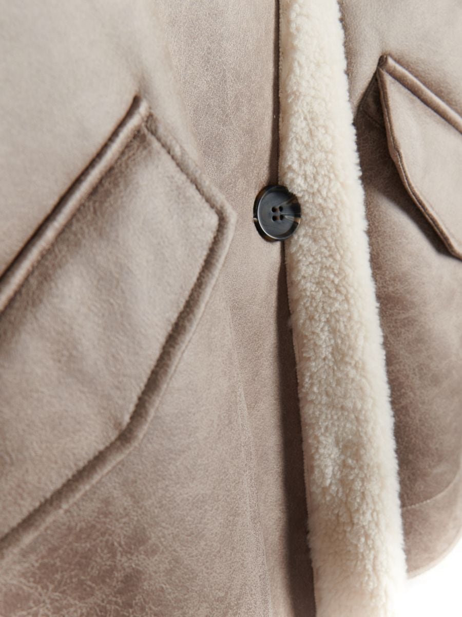 Jacket with faux shearling details