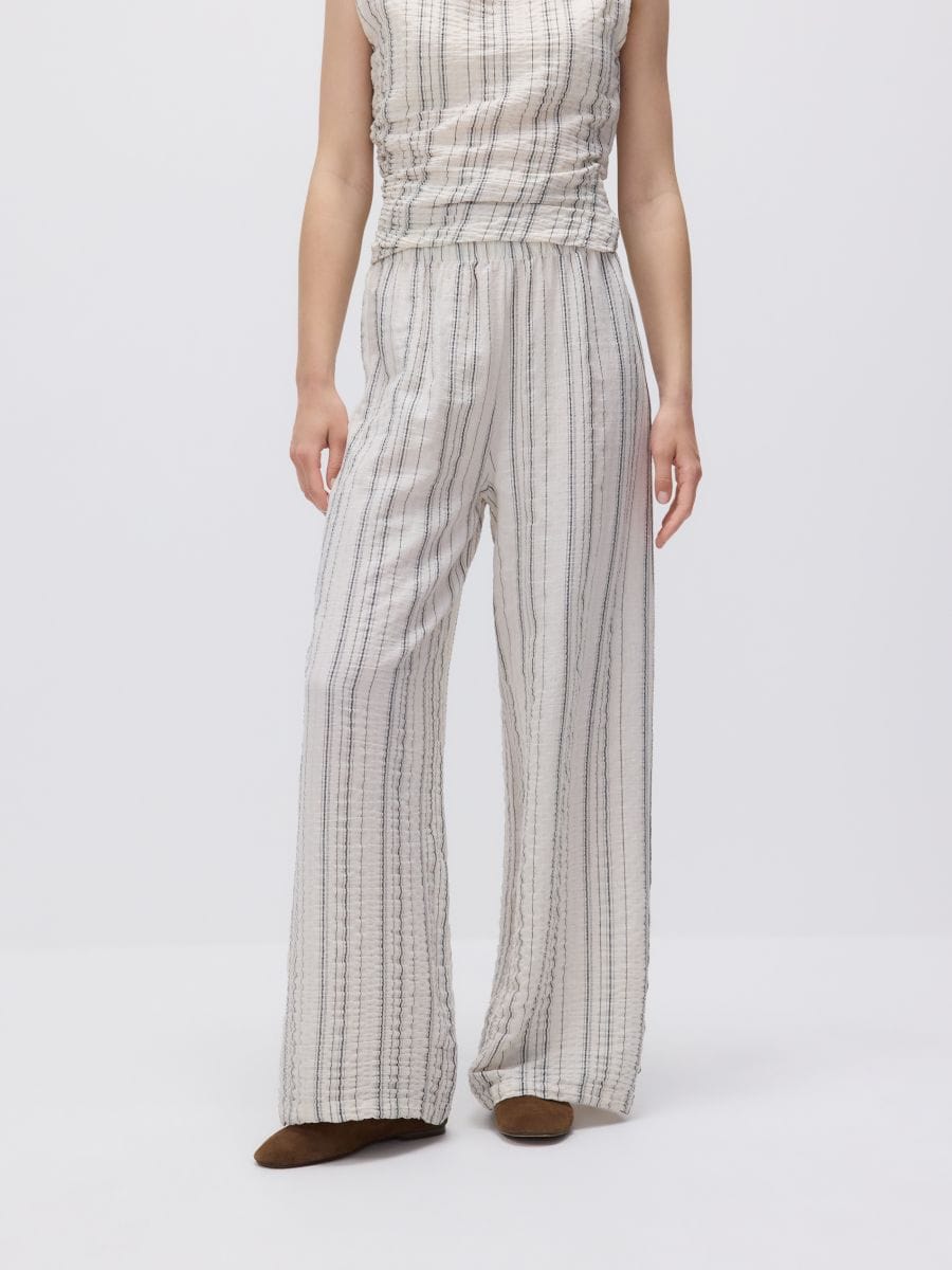 Loose trousers with metallic thread - beige - RESERVED - 4