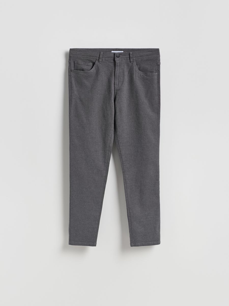 Byxor i slim fit med hög andel bomull - svart - RESERVED