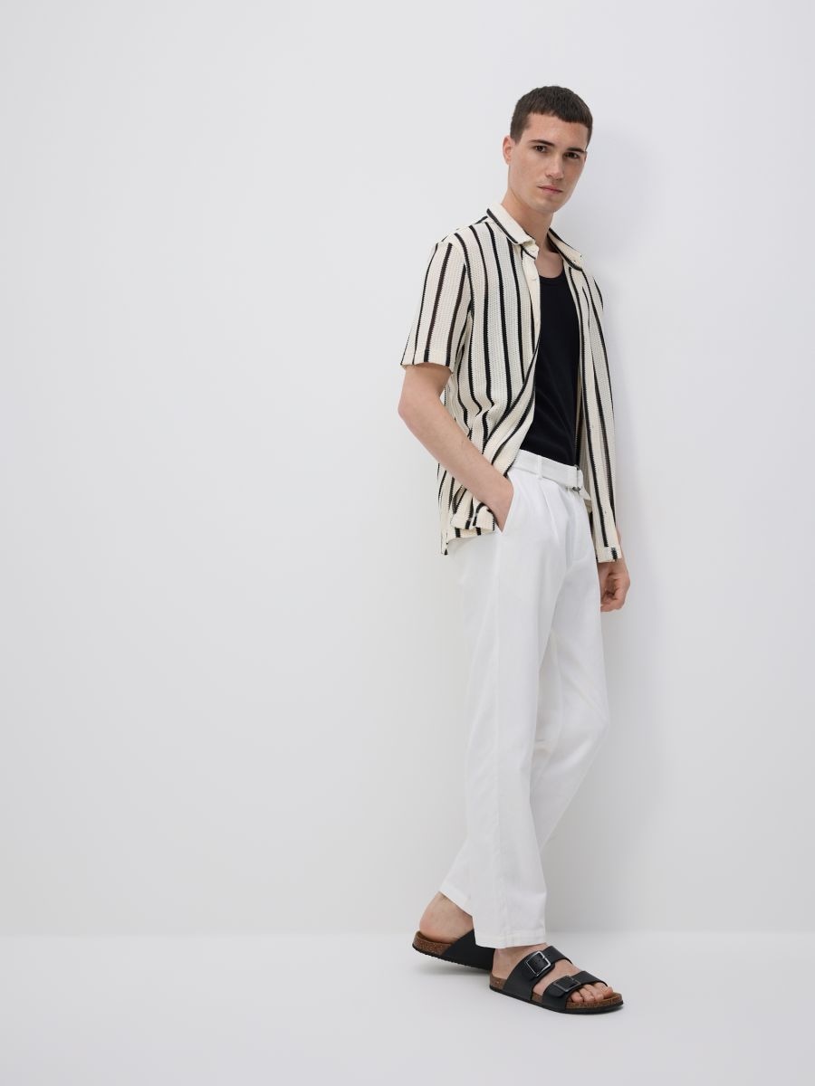 Slim-fit trousers with belt - cream - RESERVED - 4