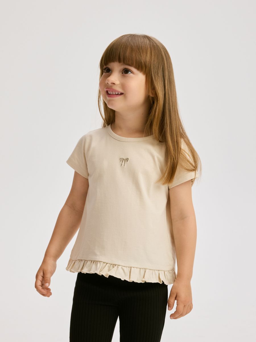 Cotton T-shirt with ruffle - beige - RESERVED