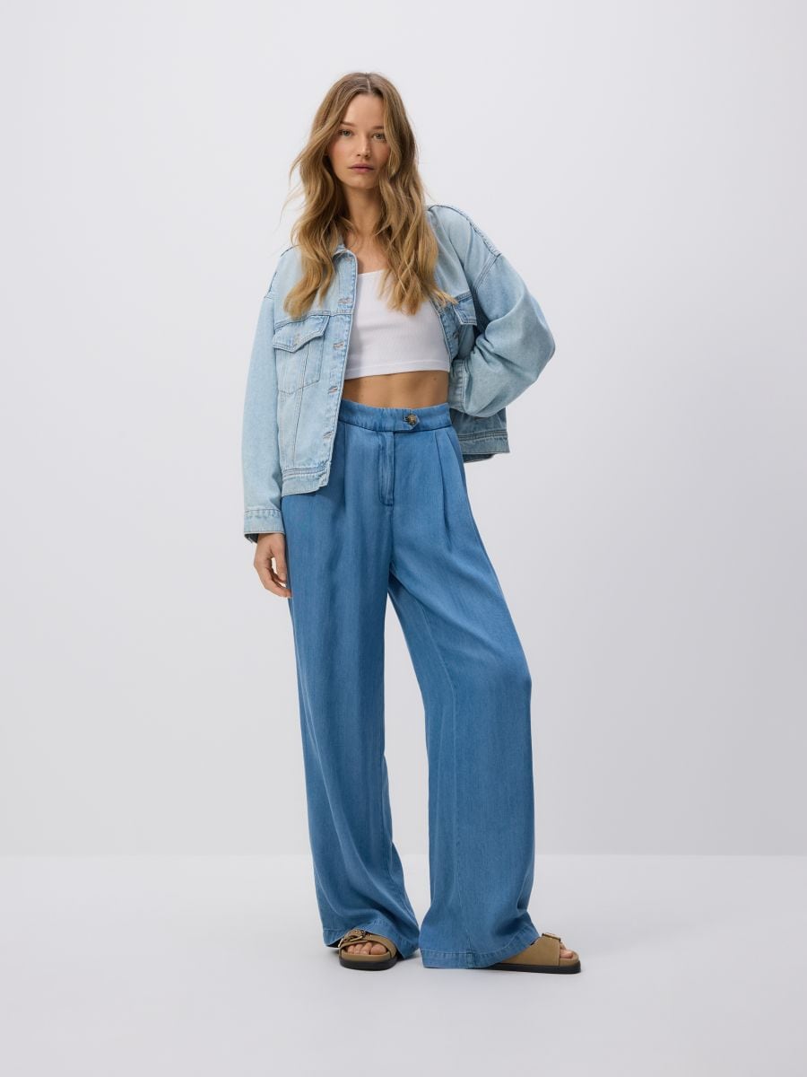 Jeansy wide leg z lyocellu - niebieski - RESERVED