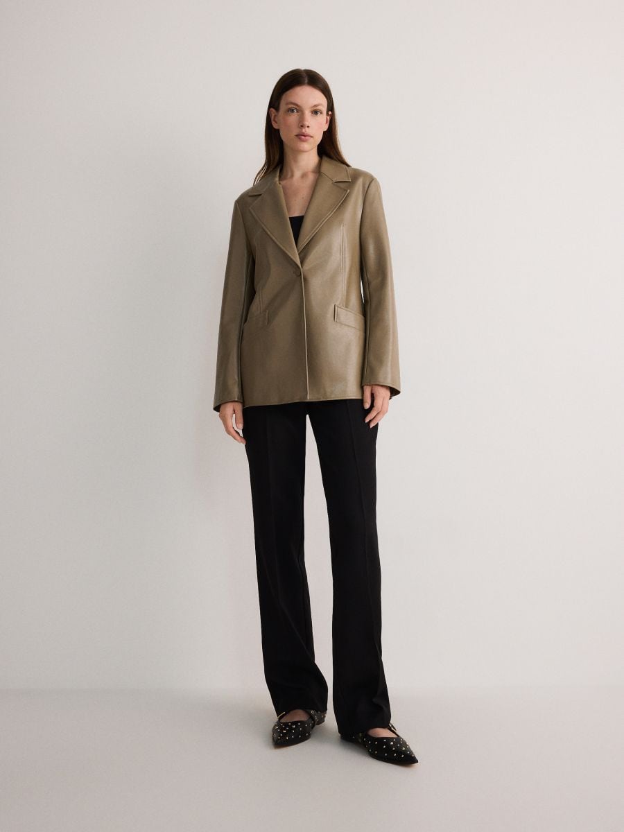 Veste de tailleur en cuir synthetique