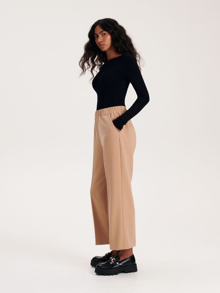 Trousers with pressed crease - beige - RESERVED - 2