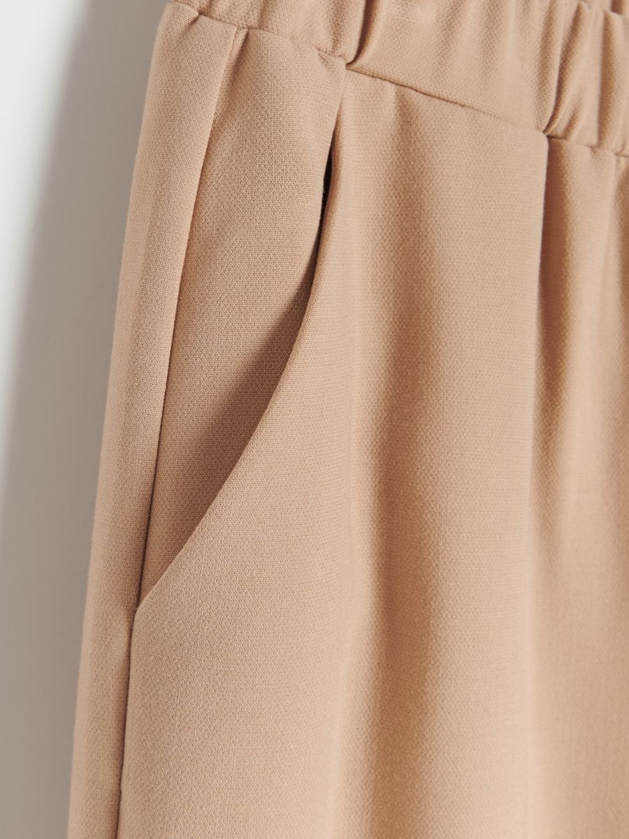Trousers with pressed crease - beige - RESERVED - 4