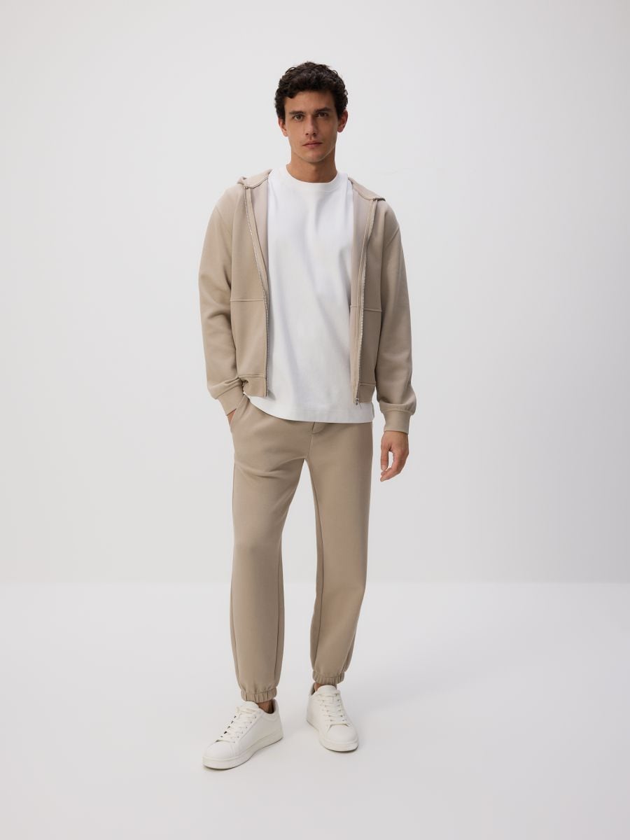Regular fit tracksuit bottoms - beige - RESERVED - 2