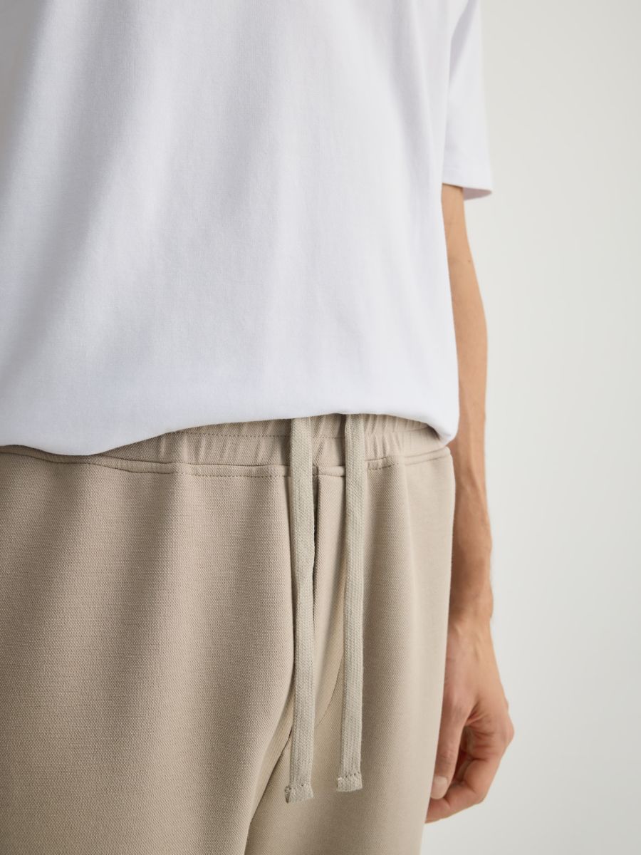Regular fit tracksuit bottoms - beige - RESERVED - 5