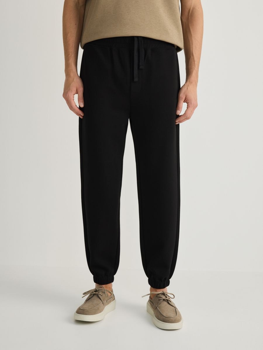 Regular fit tracksuit bottoms - black - RESERVED