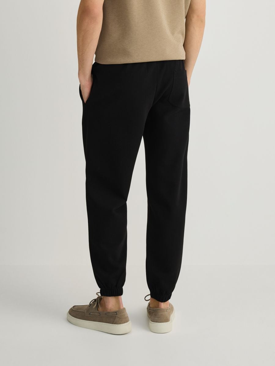 Regular fit tracksuit bottoms - black - RESERVED - 4