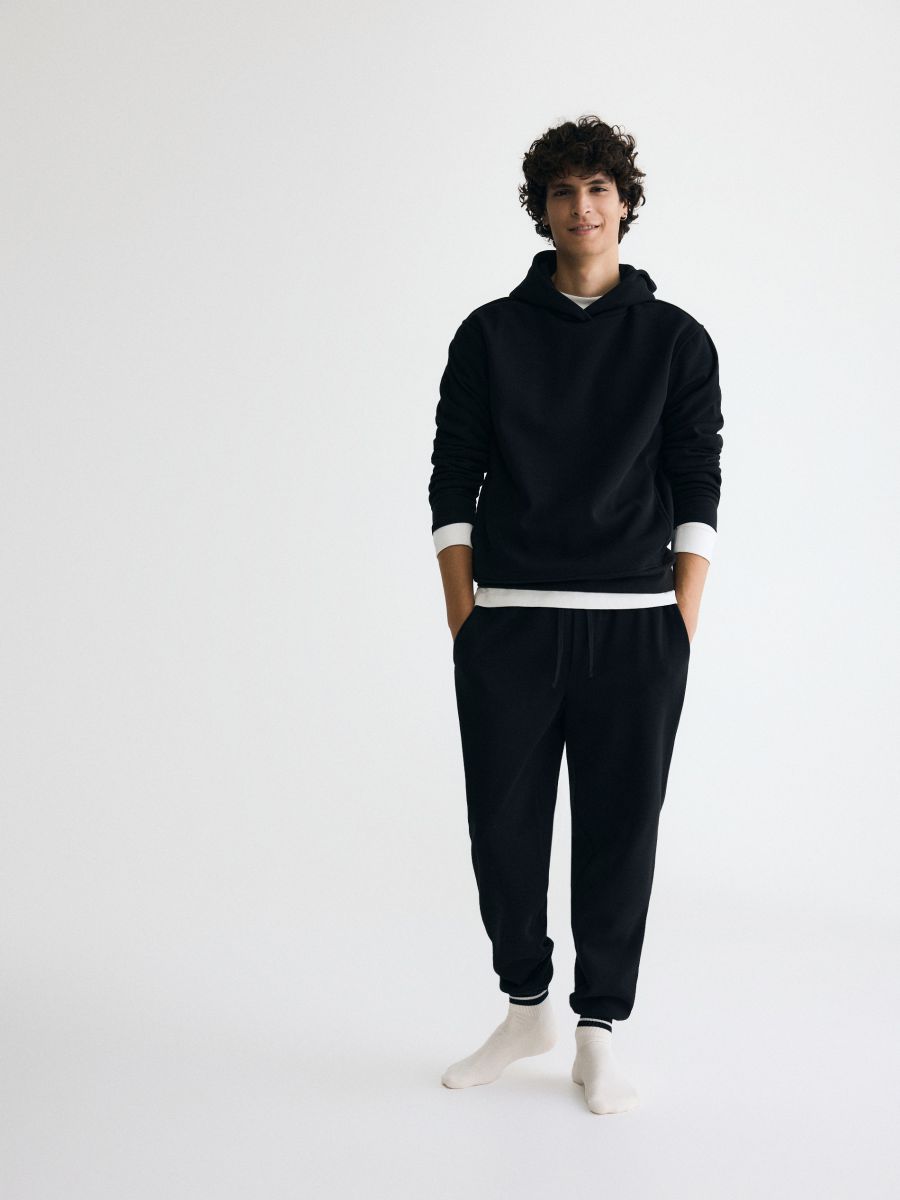 Regular fit tracksuit bottoms - black - RESERVED
