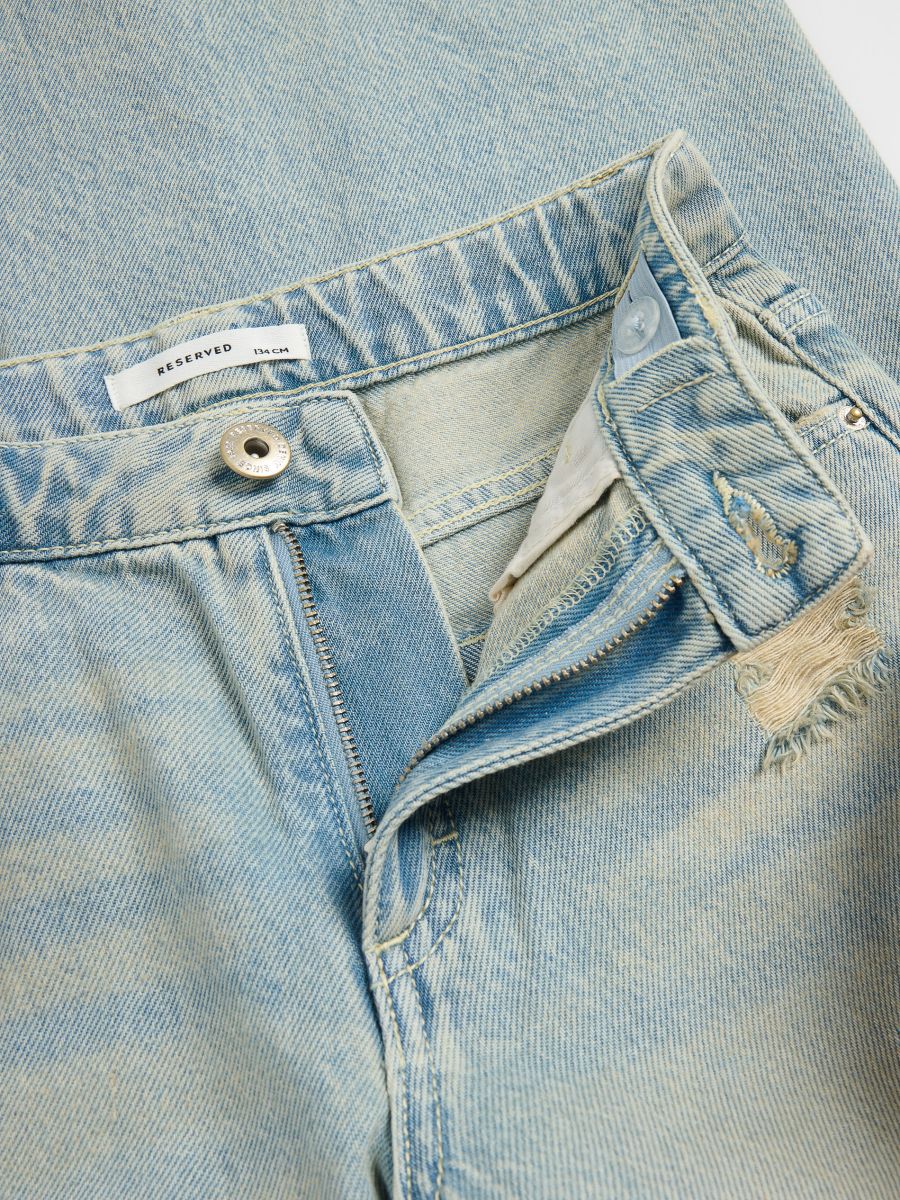Jeansy super wide leg z przetarciami Kolor niebieski