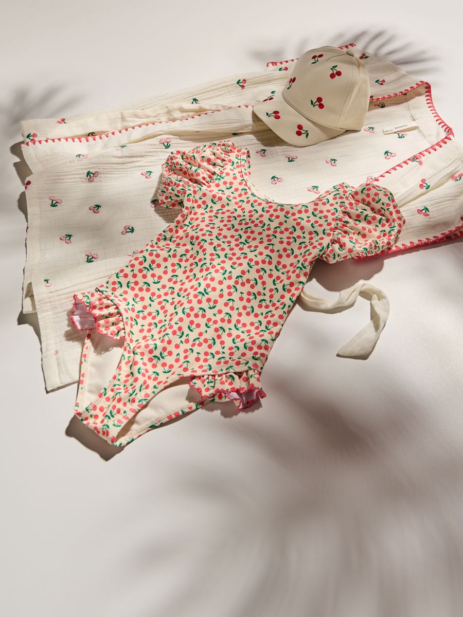 One-piece swimsuit with flounce - creme - RESERVED