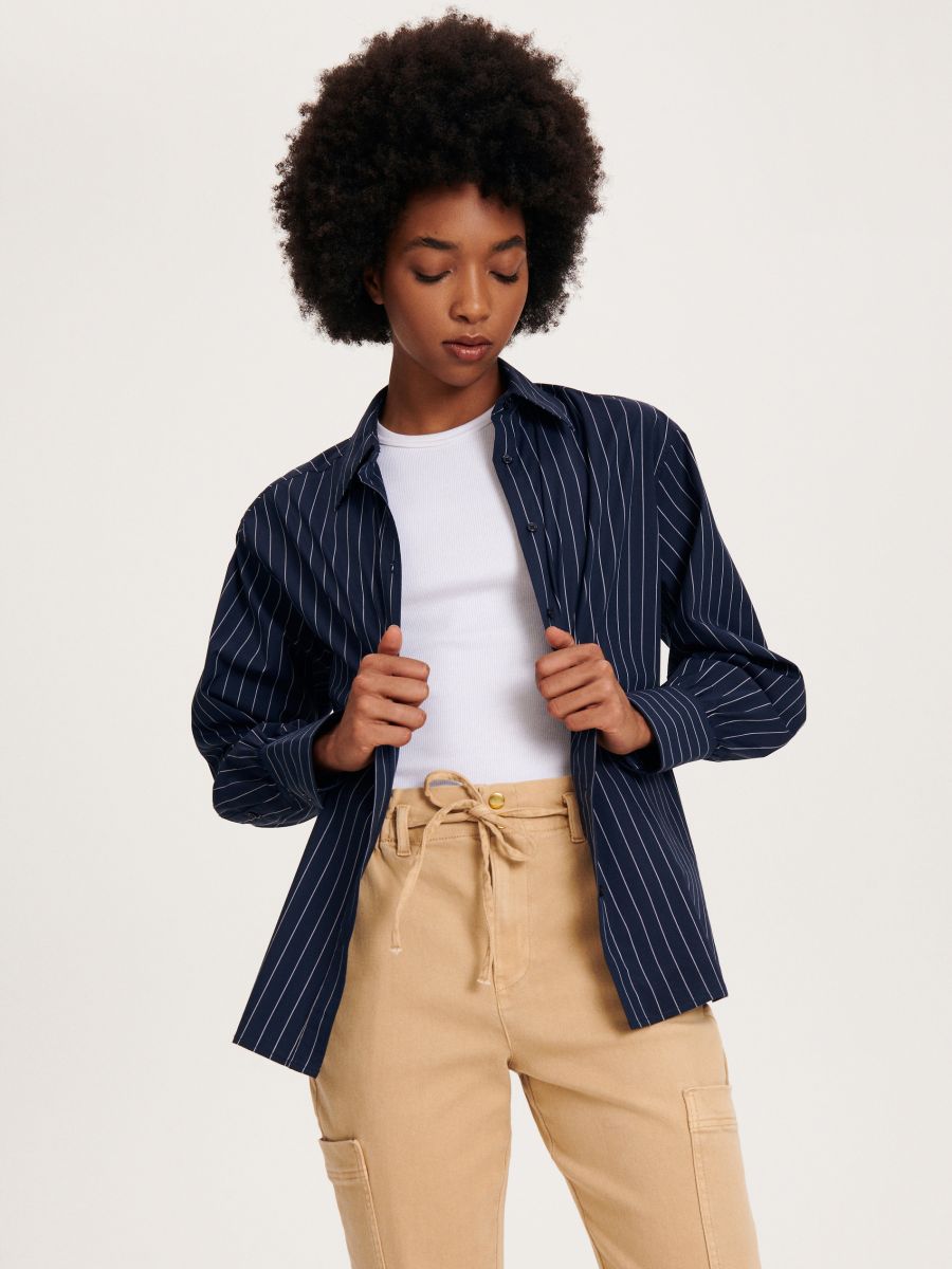 Trousers with cargo pockets - beige - RESERVED - 2