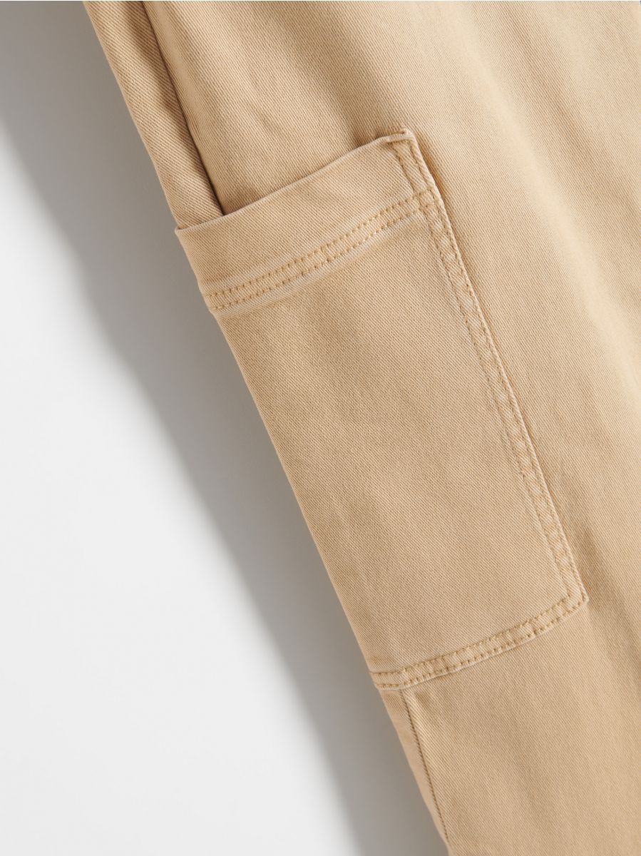 Trousers with cargo pockets - beige - RESERVED - 5