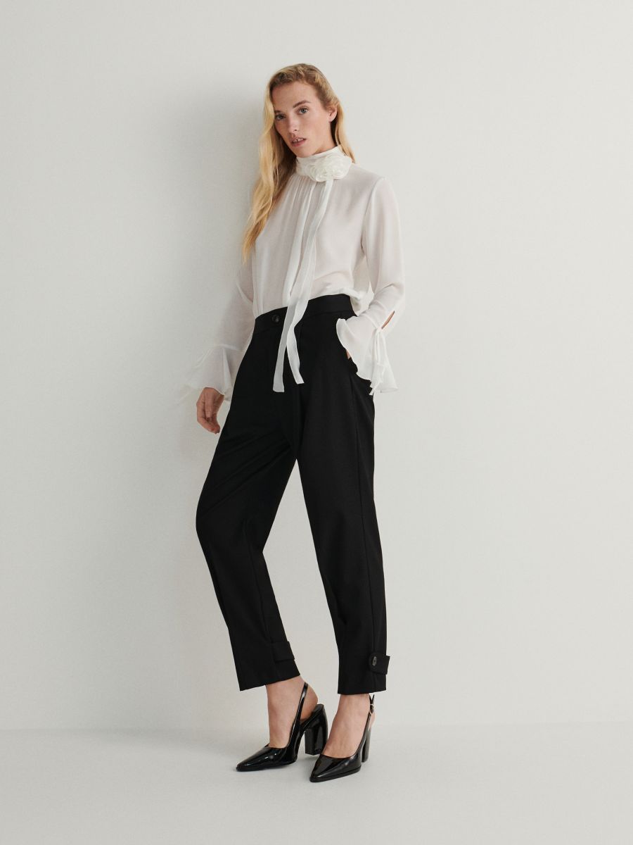 Trousers with flaps - black - RESERVED