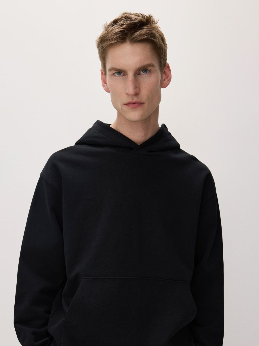 Kokvilnas džemperis ar kapuci - melns - RESERVED