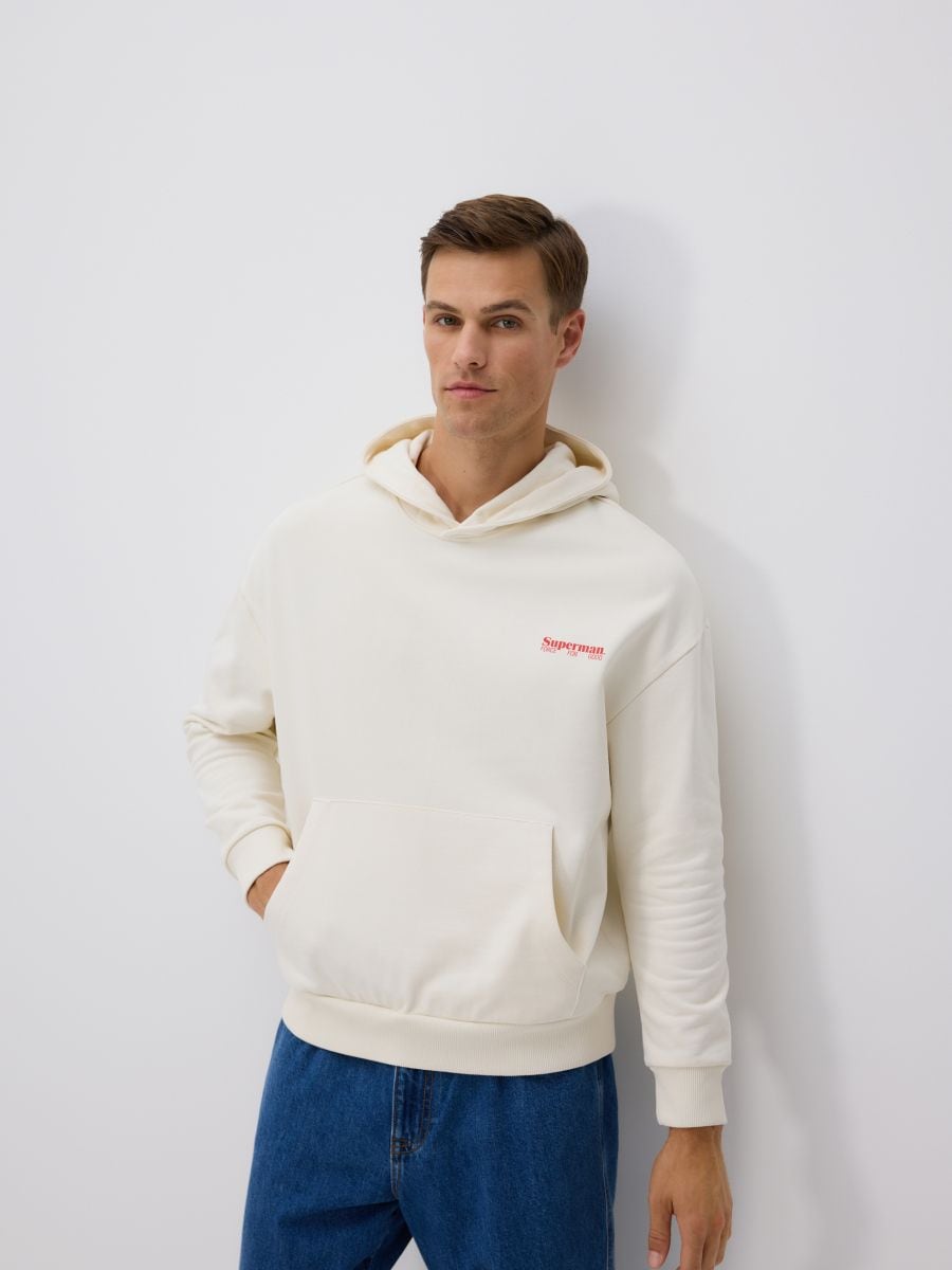 Bawełniana bluza z kapturem SUPERMAN™ - złamana biel - RESERVED