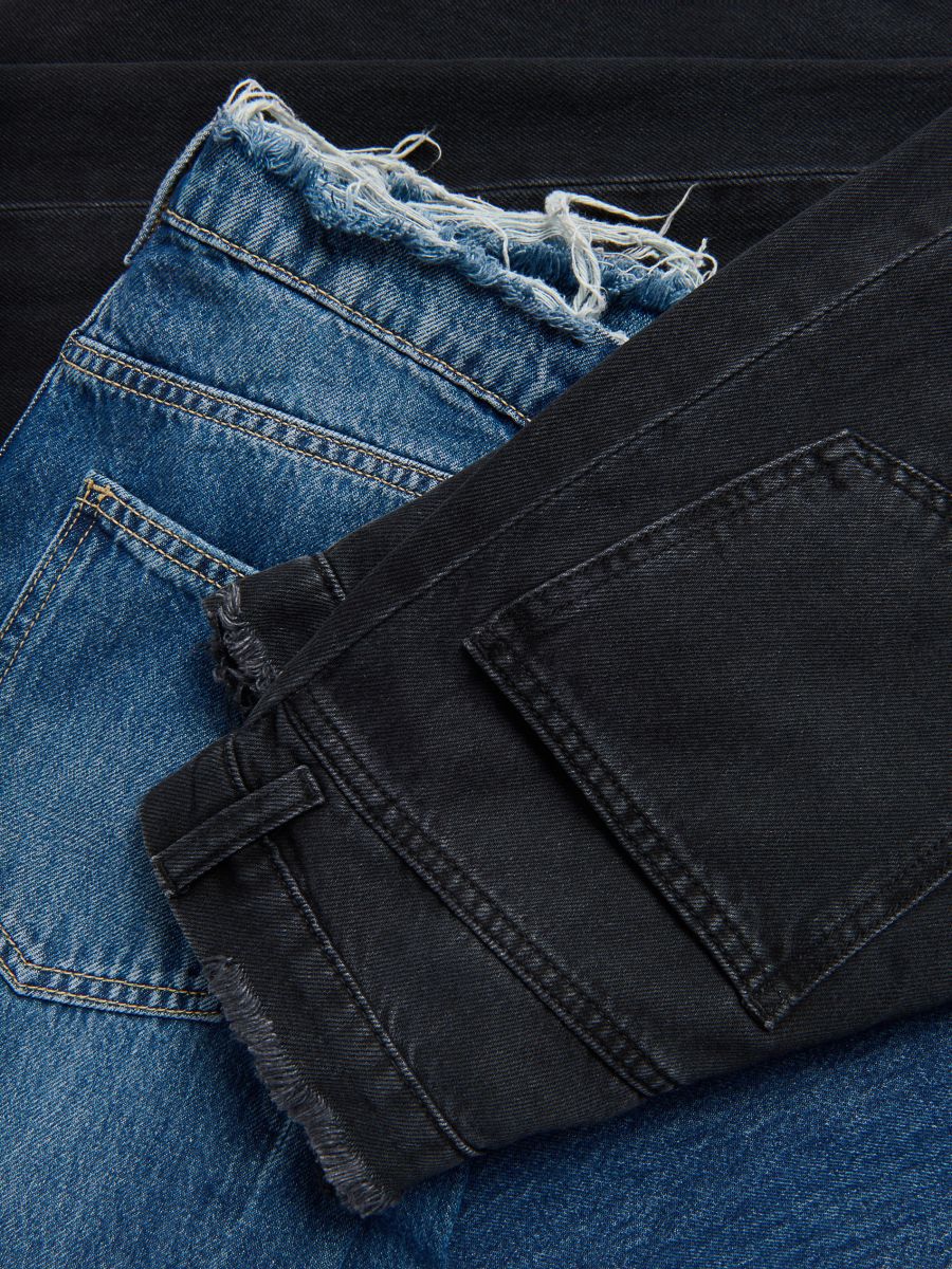 Jeansy wide leg z rozdarciami Kolor niebieski - RESERVED