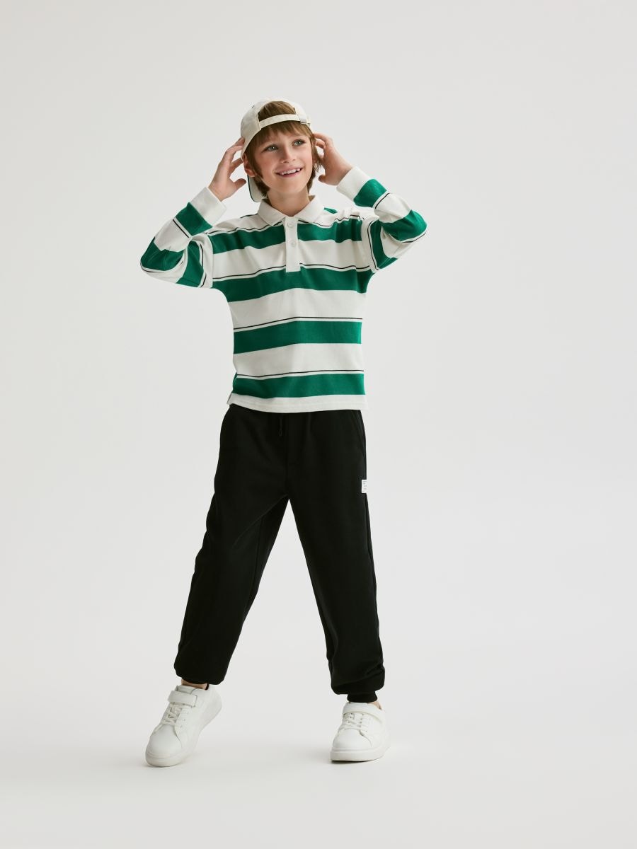 Pamučne jogger pantalone - crno - RESERVED
