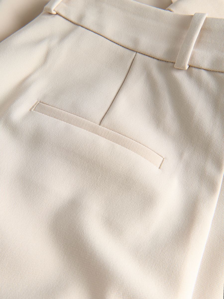 Trousers with pressed crease - beige - RESERVED - 6