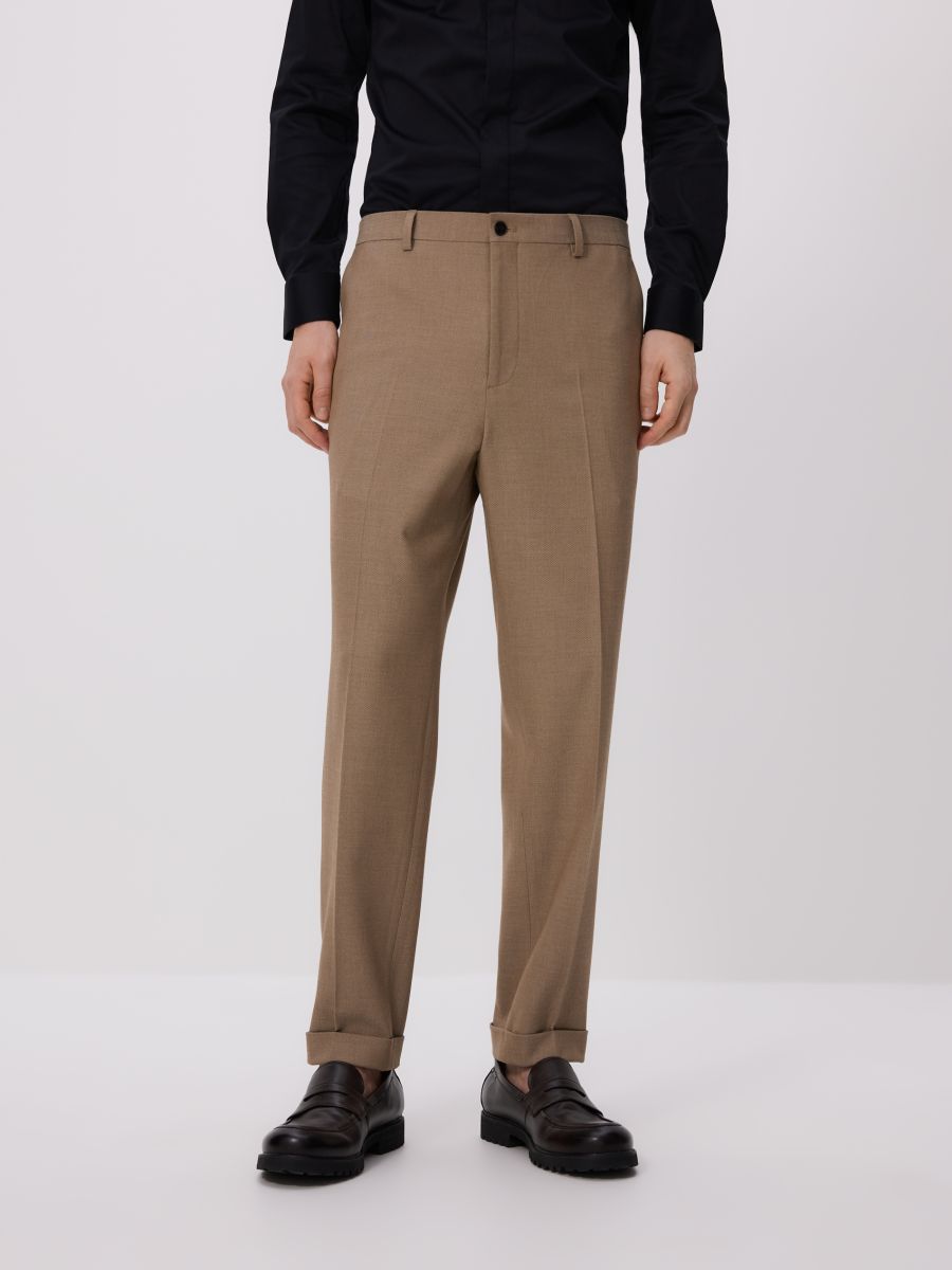 Suit trousers with pressed crease - beige - RESERVED