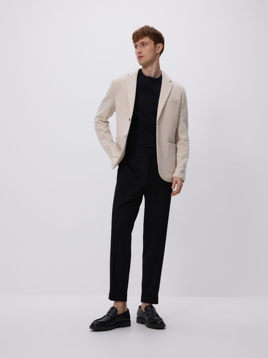 Suit trousers with pressed crease - black - RESERVED