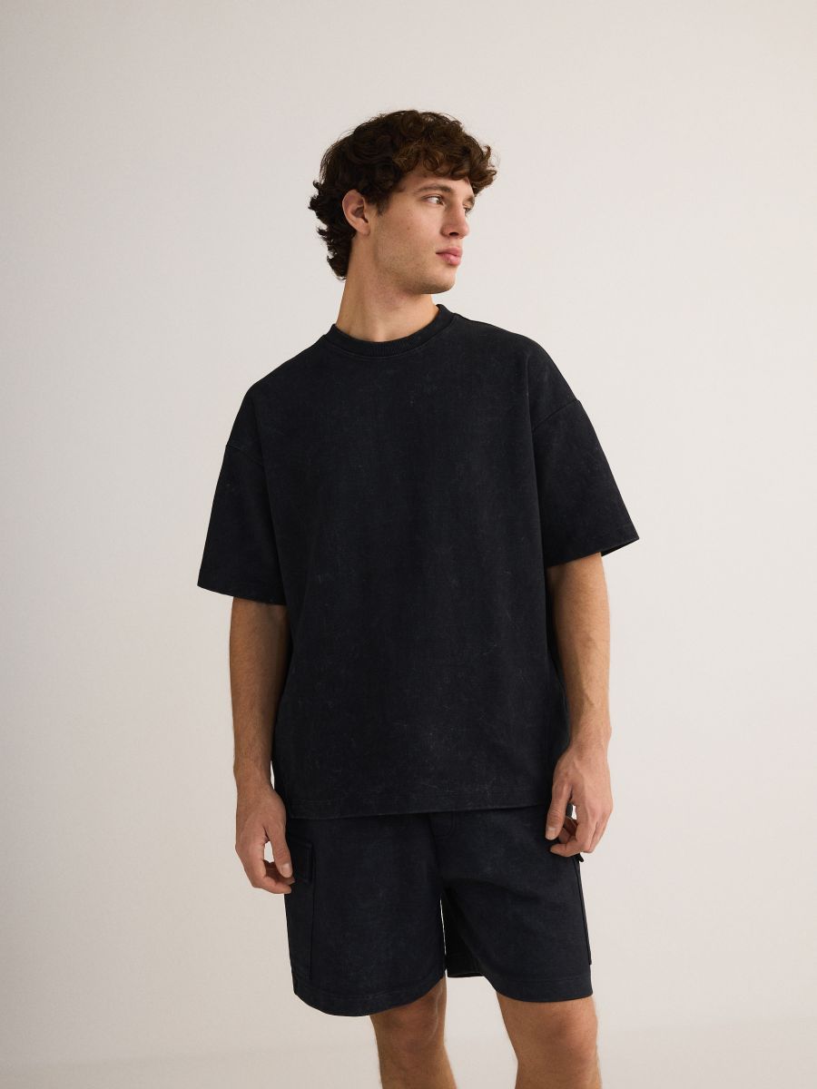 Oversized t-shirt med tvättad effekt - SVART - RESERVED