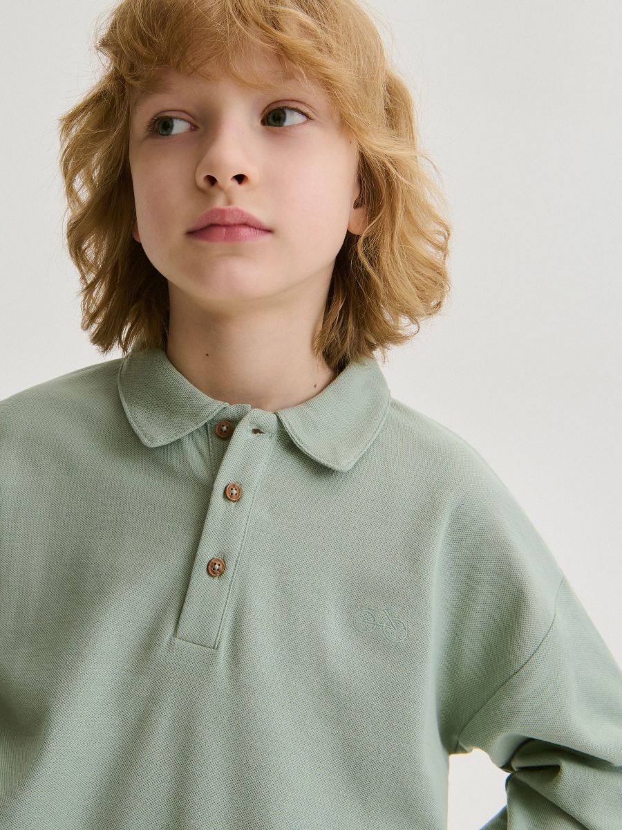 Polo manga larga oversize clearance