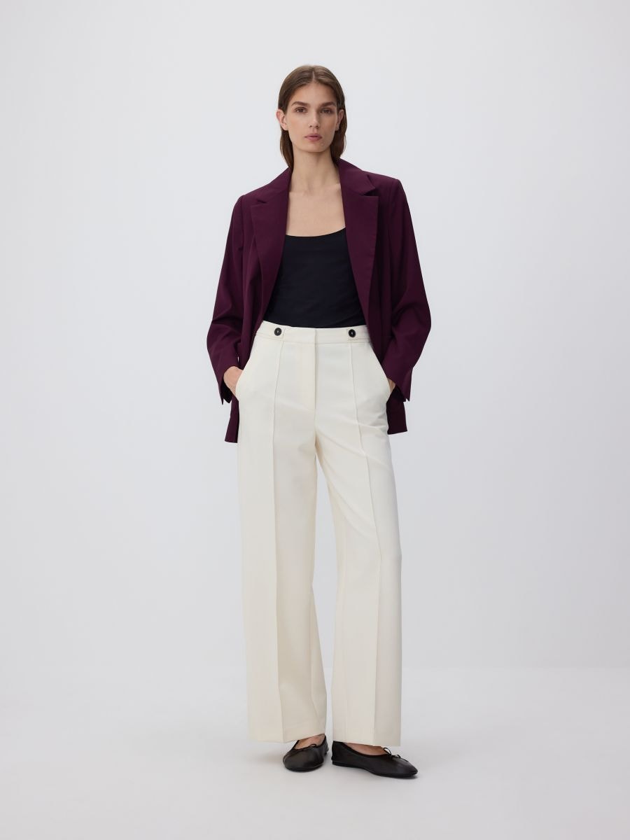Trousers with pressed crease - cream - RESERVED